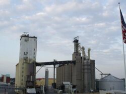 MS Shot of factory with American flag flying / St. Louis, Missouri, United States Stock Footage