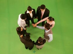 Group of business people in circle stacking hands  Stock Footage