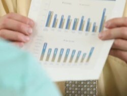 CU TU Financial Advisor Reviewing Paperwork with Clients / Richmond, Virginia, USA Stock Footage