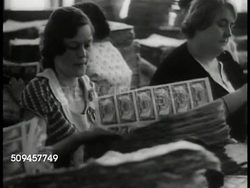 1933: U.S. CURRENCY PRINTING PRESS:  XHA WS Woman operating printing press. MS Women counting sheets of new bills. MS Printing sheets. HA LS Printing machines. Washington D.C. Great Depression, aid, economy, New Deal Instructional Video