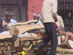 MS People lighting  fire under deadbody  during funeral ceremony AUDIO / Kathmandu, Central Region, Nepal Stock Footage