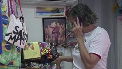 CLEAN : Michael Jackson statue given rifle by Rio narcos News Clip