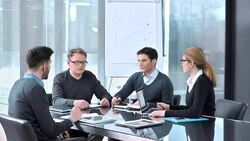 DS Company production design team members in meeting Stock Footage