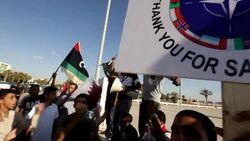 CLEAN: Libyans call for distribution of Kadhafi assets News Clip