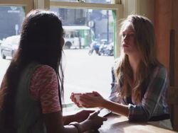 Friends walking along the into store.  Stock Footage