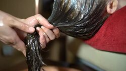Shirodhara hair treatment Stock Footage
