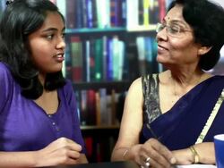 Cheerful Indian Senior Woman and Teenager Girl in Conversation Stock Footage