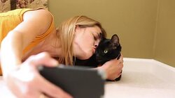 Cat Crazy Lady Taking Selfies with Kitty Stock Footage
