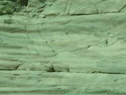 Petra archaeological site and amphitheatre, tilt down steps to columns, Jordan Stock Footage