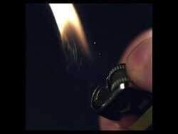 High Speed Lighter being lit, black background; 2000fps, shutter speed 1/2000 Stock Footage