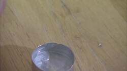 A syringe sucks up heroin. Stock Footage