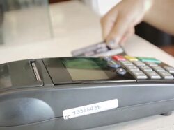 Women Swiping A Credit Card,Dolly Shot Stock Footage