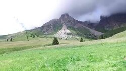 Father and son having ralax in mountain - Dolomites - Italy Stock Footage