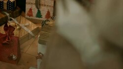 Santa Clause brings presents to familys house Stock Footage