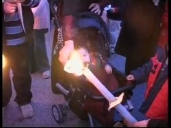 AuBC Palestinians light candles, march for peace News Clip