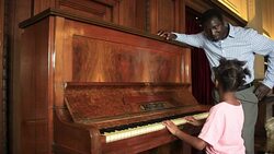Father and Daughter play piano Stock Footage