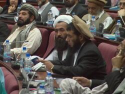 MS PAN Men and women sitting in Afghan Parliament session together AUDIO / Kabul, Kabul Province, Afghanistan Stock Footage