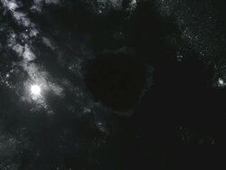 WS ZI View of black hole in center of galaxy absorbing all light and stars around / Montreal, Quebec, Canada Stock Footage