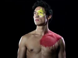 Man with Chinese flag painted on face and chest Stock Footage