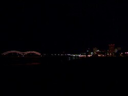 WS City skyline at night as lightning strikes on harnando de soto bridge / Memphis, Tennessee, United States Stock Footage