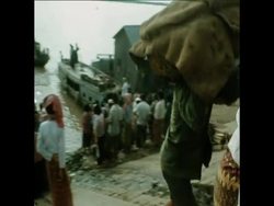 SYND 12 08 74 REFUGEES IN PHNOM PENH News Clip