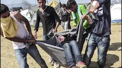 CLEAN : PHOTOS: 260 migrants hurt at Greece Macedonia border News Clip