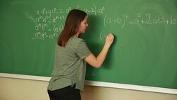 Young student writing math formula Stock Footage