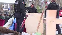 CLEAN : French protesters vow to return after police clear their camp News Clip