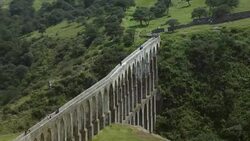 View of the ancient arches of the Xalpa aqueduct in Tepoztlan Mexico. Stock Footage
