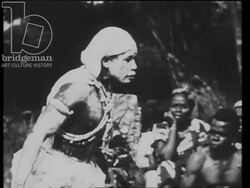 Sacred tribal dance. Sorcerer dances to the snake. Madagascar 1930s. Stock Footage