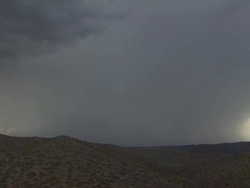 Lightning bolts in very heavy rain shower over mountains. Sonoran Desert near Tucson, Arizona, USA Stock Footage