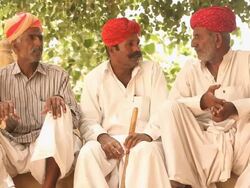Three rajasthani senior men talking, Jaisalmer, Rajasthan, India Stock Footage
