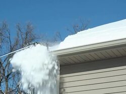 Roof Rake Removing Winter Snow Stock Footage