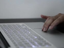 Typing on a Notebook Stock Footage