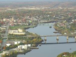 WS ARIEAL View of River over bridge  / Maine, United States Stock Footage