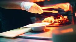 Chef finishing a meal. Stock Footage
