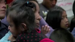 CLEAN : Migrants concerned after US raids News Clip