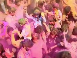 Group of people playing holi and dancing, Delhi, India Stock Footage