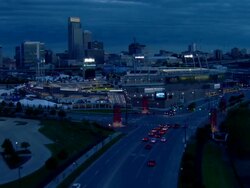 TD Ameritrade Park baseball stadium under a cloudy night sky Stock Footage