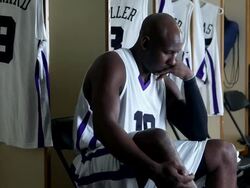 CU PAN professional basketball player in locker room mentally preparing for game / Washington, USA Stock Footage