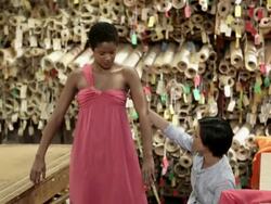 Dressmaker adjusting dress on model Stock Footage