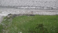 Hail pound homes fills streets tornado siren Denver Colorado Stock Footage