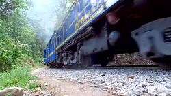Train going to Aguascalientes near Machu picchu Stock Footage