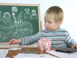 little boy and money from piggy bank Stock Footage
