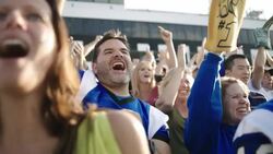 Stadium crowd cheers at football game Stock Footage