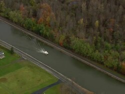 WS AERIAL TS Shot of speed boat moving through canon / New York, United States Stock Footage