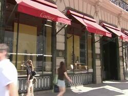 MS, Pedestrians passing by Cartier store window displays, New York City, New York, USA Stock Footage