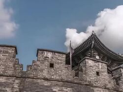 MS T/L ZO View of Suwon Hwaseong Castle Janganmun Gate (Unesco World Heritage)  / Suwon, Gyeonggi do, South Korea Stock Footage