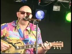 Solo guitar and harmonicist performance: Woody Mann, Great Britain Stock Footage