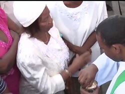 Drumbeats called the faithful to a Sunday Mass praising God amid a scene resembling the Apocalypse _ a collapsed cathedral in a city cloaked with the smell of death and rattled by gunfire News Clip